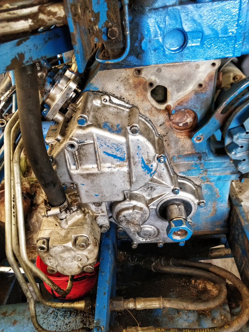 Torqued down to 7-ft-lbs. Was a real PITA to reconnect the linkage to the injection pump from the governor.